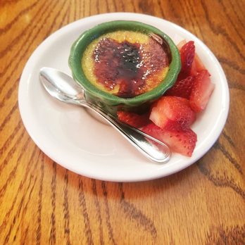 Woody's Library Restaurant - Creme Brulee bite-sized dessert. It is truly delicious but as advertised, it really is bite-sized. Even the spoon is tiny. - New American Near Me - Carmel, Indiana Woody's Library Restaurant - Creme Brulee bite-sized dessert. It is truly delicious but as advertised, it really is bite-sized. Even the spoon is tiny. - New American Near Me - Carmel, Indiana
