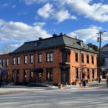 Third and Main - a brick building with a black roof - American Near Me - Aurora, Indiana