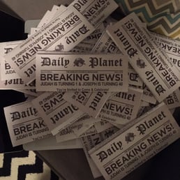 Superman newspaper birthday invitations that Jody helped make. So so happy with the way they turned out.