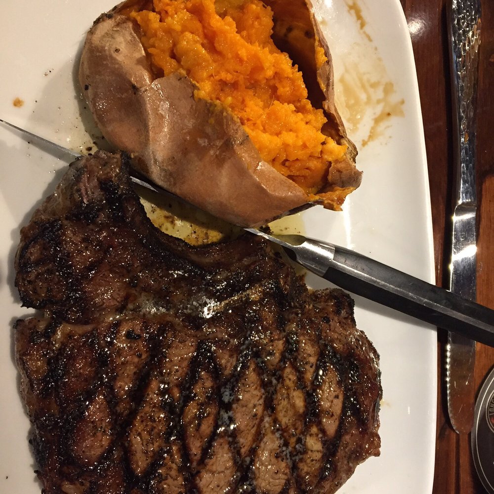 LongHorn Steakhouse - Outlaw ribeye and baked sweet potato . - Steakhouses Near Me - Spring Hill, Tennessee LongHorn Steakhouse - Outlaw ribeye and baked sweet potato . - Steakhouses Near Me - Spring Hill, Tennessee