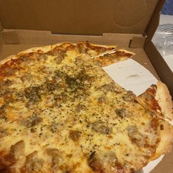 Italian Fiesta Pizzeria - This is how I received my pizza with 2 slices missing.  I called back once I got home 40 minutes away ,