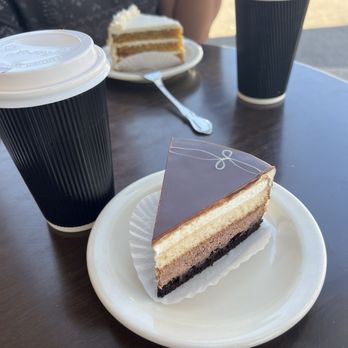 Croissant-Brioche - White and black chocolate cake in front and carrot cake in the back - Bakeries Near Me - Houston, Texas