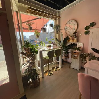 Sugar ‘n Spice Cheesecakes & Coffee - a pink room with a pink chair and a clock - Bakeries Near Me - Wausau, Wisconsin Sugar ‘n Spice Cheesecakes & Coffee - a pink room with a pink chair and a clock - Bakeries Near Me - Wausau, Wisconsin