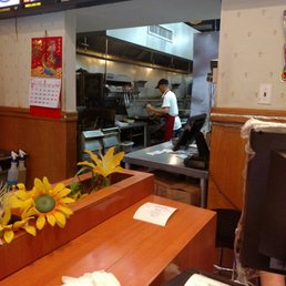 a man in a restaurant kitchen a man in a restaurant kitchen