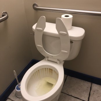 Piedmont Steak House - a toilet with the seat up - Steakhouses Near Me - Culpeper, Virginia