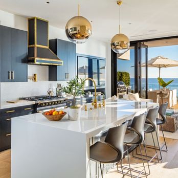 Carrara - Gourmet kitchen featuring professional-grade appliances, quartz countertops, and stunning ocean views for our culinary wellness programs. - Rehabilitation Center Near Me - Malibu, California