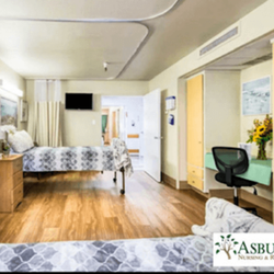 Hardwood floors and spacious living area with desk and ample storage