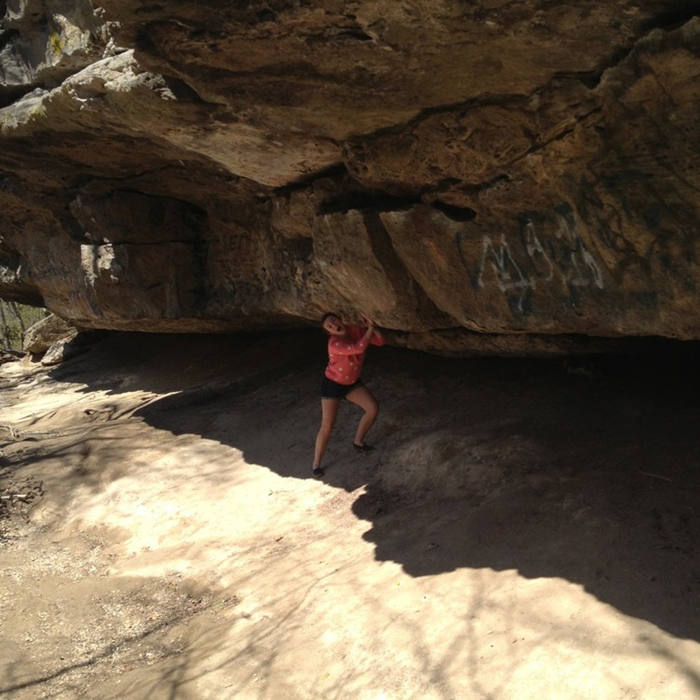 Meg pretending to hold up the massive rock ledge Meg pretending to hold up the massive rock ledge