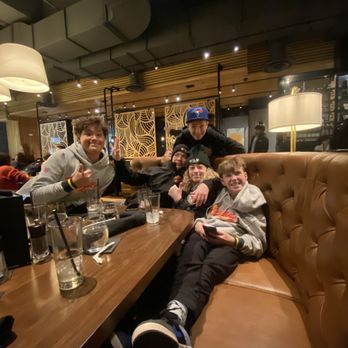 Milestone's Grill and Bar - My hockey team having lots of fun at milestones - Steakhouses Near Me - Pointe-Claire, Quebec