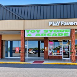 Play Favorites - Play Favorites storefront features bright Toy Store & Arcade banner, large display windows filled with toys, and a welcoming ...