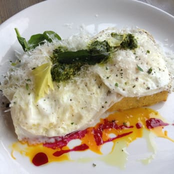 Nicks On Broadway - Egg and Polenta entree. I got mine with over easy eggs but you can get any style you want. - New American Near Me - Providence, Rhode Island Nicks On Broadway - Egg and Polenta entree. I got mine with over easy eggs but you can get any style you want. - New American Near Me - Providence, Rhode Island