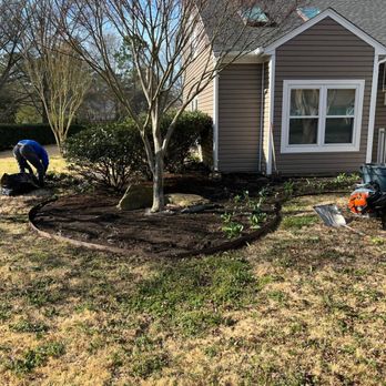 Tk's Landscaping - two men working in the yard - Lawn Services Near Me Tk's Landscaping - two men working in the yard - Lawn Services Near Me