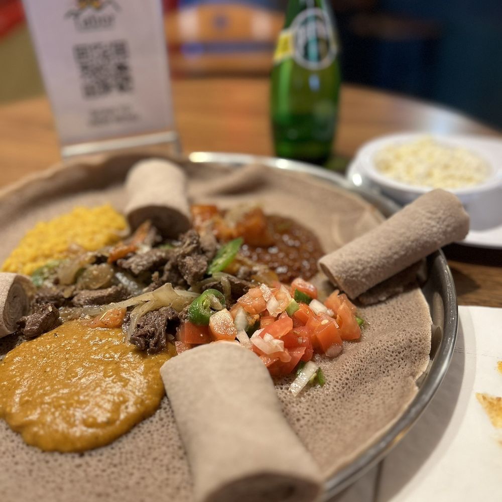 This is Lega Tibs and 4 veggie special. The Shiro (chickpea sauce) in the foreground was especially tasty.