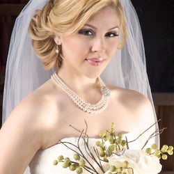 Hair and makeup by the La Vie de Luxe bridal beauty team.