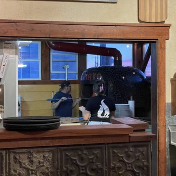 Sfumato Pizzeria - two people in the kitchen - Pizza Near Me - Alton, Iowa Sfumato Pizzeria - two people in the kitchen - Pizza Near Me - Alton, Iowa