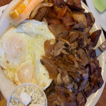 Oakland Grill - Steak and eggs sunny with grilled onions and mushrooms. ( bleu cheese upon request) - Breakfast & Brunch Near Me - Oakland, California Oakland Grill - Steak and eggs sunny with grilled onions and mushrooms. ( bleu cheese upon request) - Breakfast & Brunch Near Me - Oakland, California
