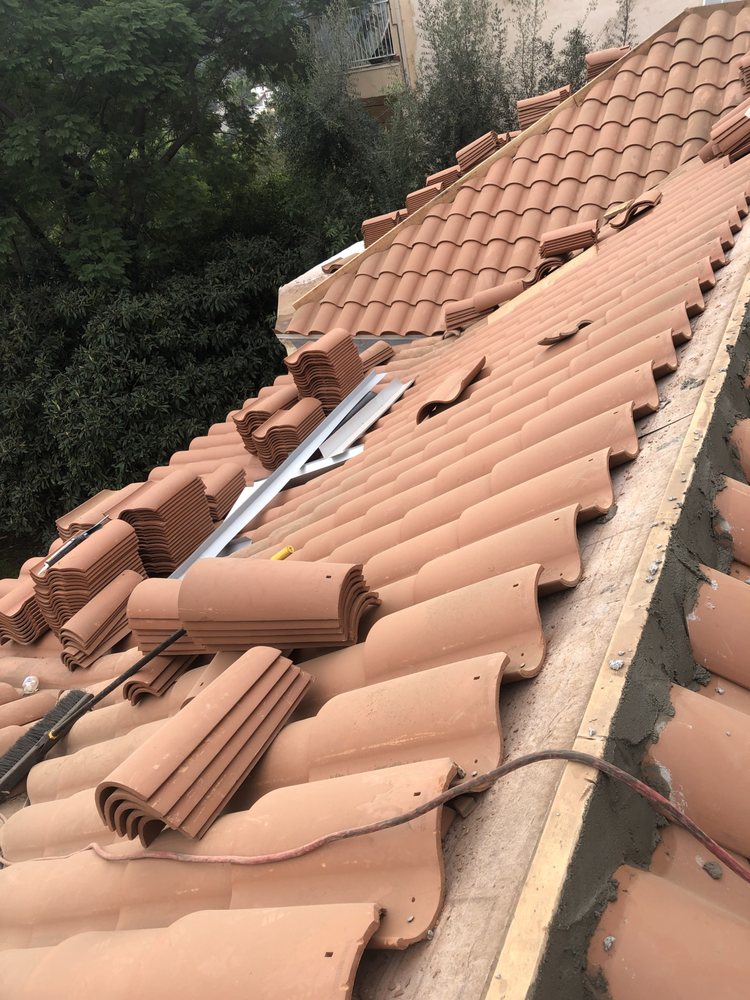 Slide of Top Elite Roofing