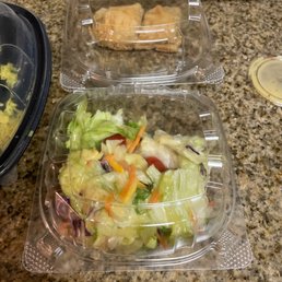 Garden salad & two tiny pieces of Baklava Garden salad & two tiny pieces of Baklava