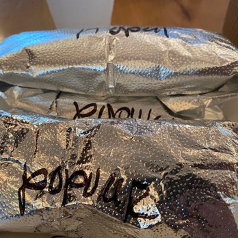 Luchi & Joey's - two burritos wrapped in foil - Mexican Near Me - Houston, Texas Luchi & Joey's - two burritos wrapped in foil - Mexican Near Me - Houston, Texas