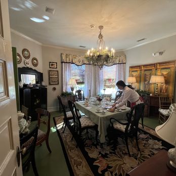 A Cause For Tea - a woman sitting at a dining room table - Tea Rooms Near Me - Monroe, North Carolina A Cause For Tea - a woman sitting at a dining room table - Tea Rooms Near Me - Monroe, North Carolina