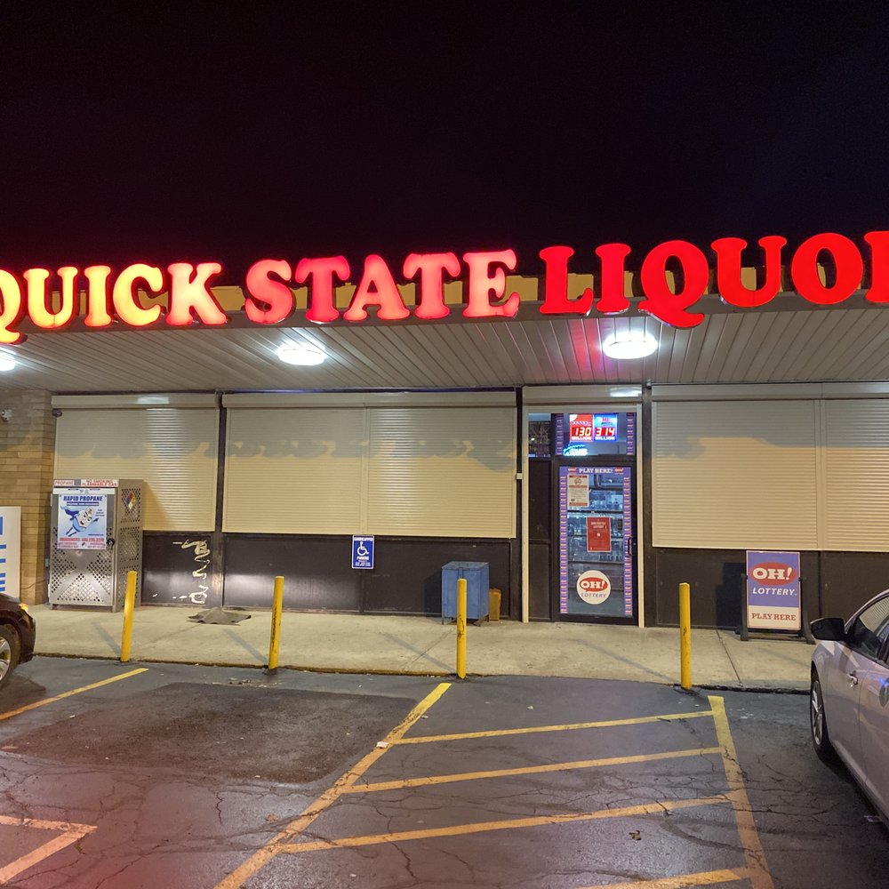 Quick State Liquor - a car parked in front of the store - Beer, Wine & Spirits Near Me - Brook Park, Ohio