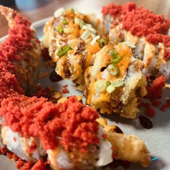 Sushi Hi - Auska Roll in middle, with Shrimp Tempura Roll and Rock'n Roll - Sushi Bars Near Me - Austin, Texas