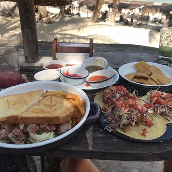Papaya Playa Restaurant - Complimentary nachos with dip, tuna sandwich, and shrimp tacos - Seafood Near Me - Tulum, ROO