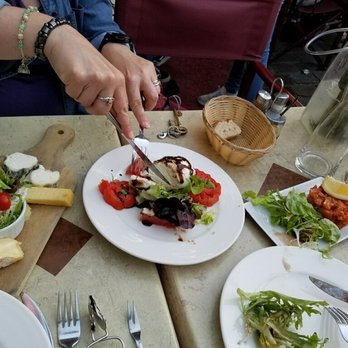Chez Bruno - Ridiculously amazing appetizers. Four cheese selection, mozzarella and tomatoes salad and salmon tartar. Order these dishes!! Yum. - French Near Me - Paris, 75