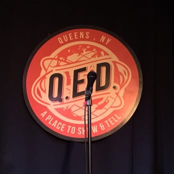 QED Astoria - Logo over the stage - Comedy Clubs Near Me - Astoria, New York QED Astoria - Logo over the stage - Comedy Clubs Near Me - Astoria, New York