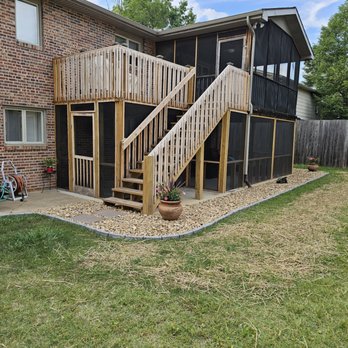 Big Ben Enterprise - a back yard with a deck and stairs - Excavation Services Near Me Big Ben Enterprise - a back yard with a deck and stairs - Excavation Services Near Me