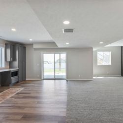 McKean's Floor to Ceiling - Basement Remodel Project, LVT & Carpet Flooring, Quartz Countertops, Tile Backsplash by McKean's