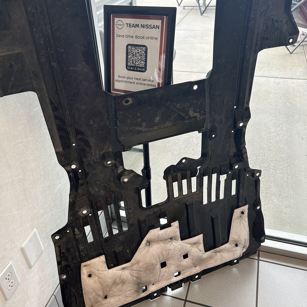 Team Nissan - Larger view of piece that is under the car. - Auto Repair Near Me - Oxnard, California