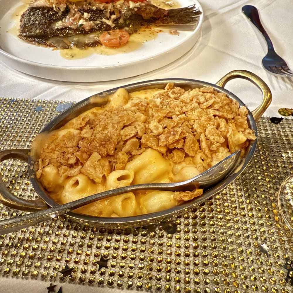 Staigle's Steakhouse - Pimento Mac & cheese (a friends stuffed flounder in the background as well) - Steakhouses Near Me - Wiggins, Mississippi Staigle's Steakhouse - Pimento Mac & cheese (a friends stuffed flounder in the background as well) - Steakhouses Near Me - Wiggins, Mississippi