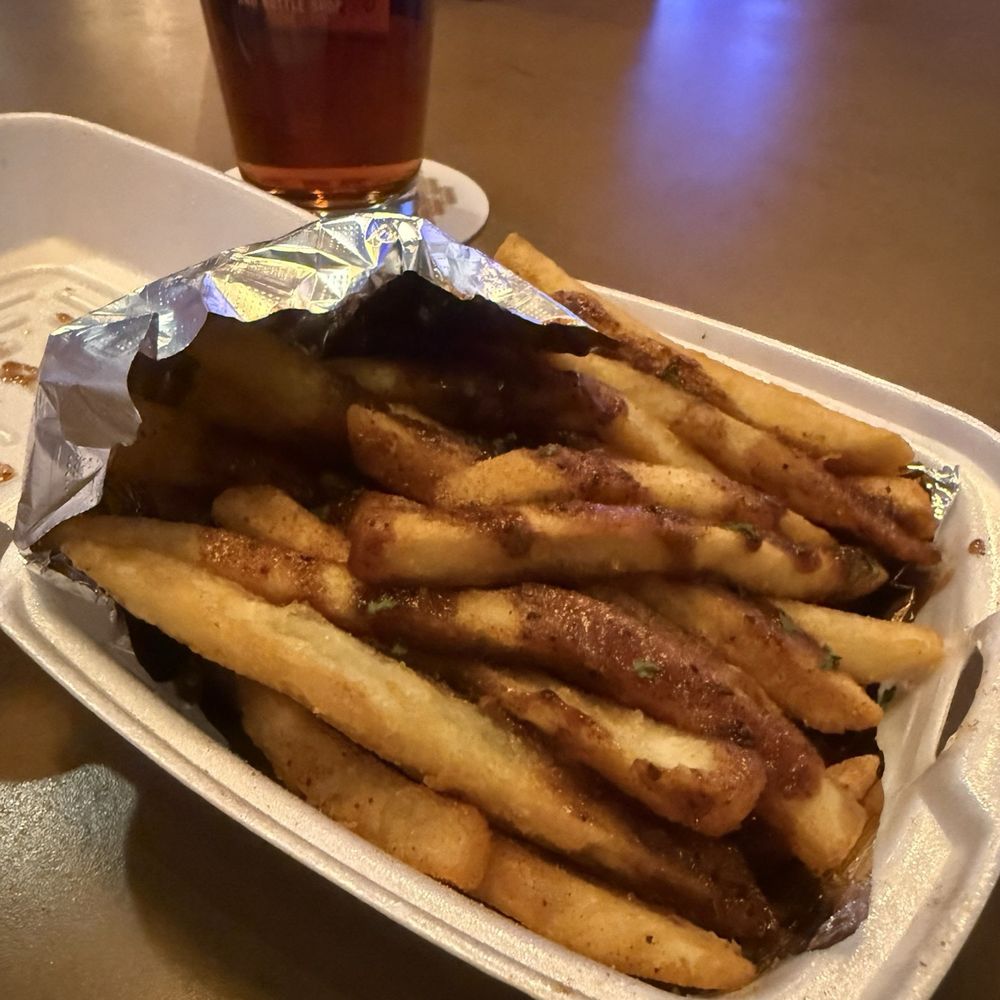 Midwestwings - Midwest fries with jerk sauce - 9/10 sooo good - Chicken Wings Near Me - Phoenix, Arizona