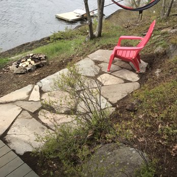 Gnome Landscapes, Design, Masonry & Maintenance - a hammock on a stone patio overlooking a lake - Landscaping Near Me - Falmouth, Maine