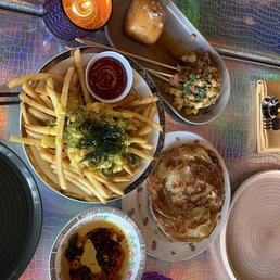 salted egg yolk fries, roti canai, shrimp skewers salted egg yolk fries, roti canai, shrimp skewers