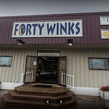 Forty Winks - Outside storefront. Wheelchair access on south side parking lot. - Mattresses Near Me - Sedalia, Missouri