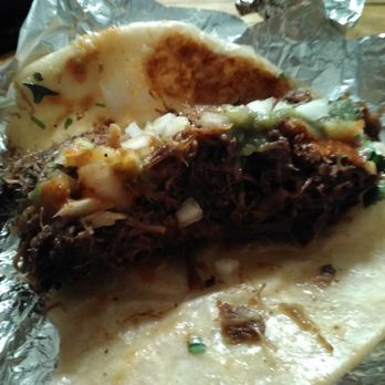 Checho Tacos - Barbacoa with onion and cilantro and I put both red and green salsa - Tacos Near Me - New Braunfels, Texas Checho Tacos - Barbacoa with onion and cilantro and I put both red and green salsa - Tacos Near Me - New Braunfels, Texas