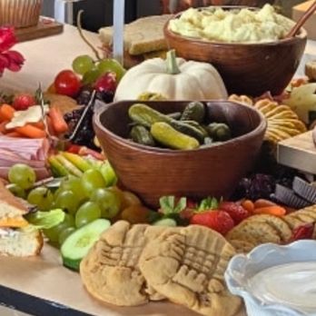 She Serves - Potato Salad, lots of decorations, artisan breads, fruits, pickles, veggies and that was only a quarter of the table! - Caterers Near Me She Serves - Potato Salad, lots of decorations, artisan breads, fruits, pickles, veggies and that was only a quarter of the table! - Caterers Near Me