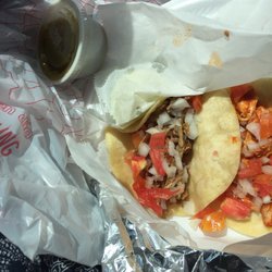 Lonchera Aguilares - Pollo and Carne tacos- size of a Krystal burger but very good.  The tomatillos sauce has a little heat.  Order way more than two!!!