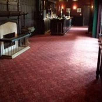 Wright Carpets - a red carpeted room - Flooring Near Me - Wattsburg, Pennsylvania Wright Carpets - a red carpeted room - Flooring Near Me - Wattsburg, Pennsylvania