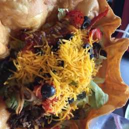 a plate of nachos with cheese a plate of nachos with cheese