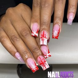 Nail Addicts - Christmas frenchie design with bows, snowflakes and peppermints done by Arianna.