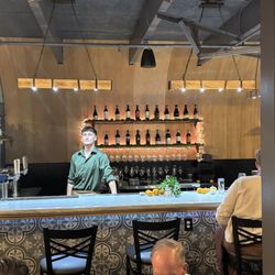 The Muse - Bar complete with bartender