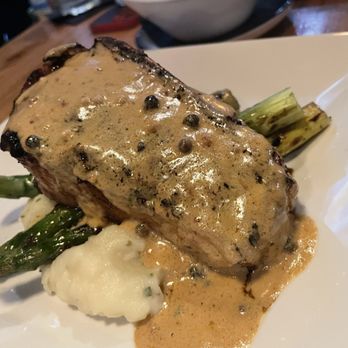 O.A.K. Prime Kitchen and Bar - 12 oz bone in espresso rubbed prime strip Veal with Demi glaze - Cocktail Bars Near Me - Myrtle Beach, South Carolina O.A.K. Prime Kitchen and Bar - 12 oz bone in espresso rubbed prime strip Veal with Demi glaze - Cocktail Bars Near Me - Myrtle Beach, South Carolina