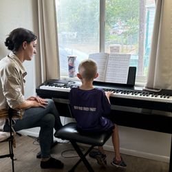Moab Music Lessons - Chelsea teaching my son how to play the piano