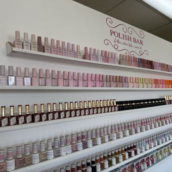Creative Nail Spa - Entire wall of fresh new polish colors! - Waxing Near Me - Belmont, California