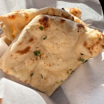 Highland's Indian Cuisine - Garlic Naan - Indian Near Me - Highlands Ranch, Colorado Highland's Indian Cuisine - Garlic Naan - Indian Near Me - Highlands Ranch, Colorado