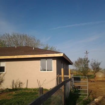 Circle Bluff Construction - a house with a fenced in yard - General Contractors Near Me Circle Bluff Construction - a house with a fenced in yard - General Contractors Near Me