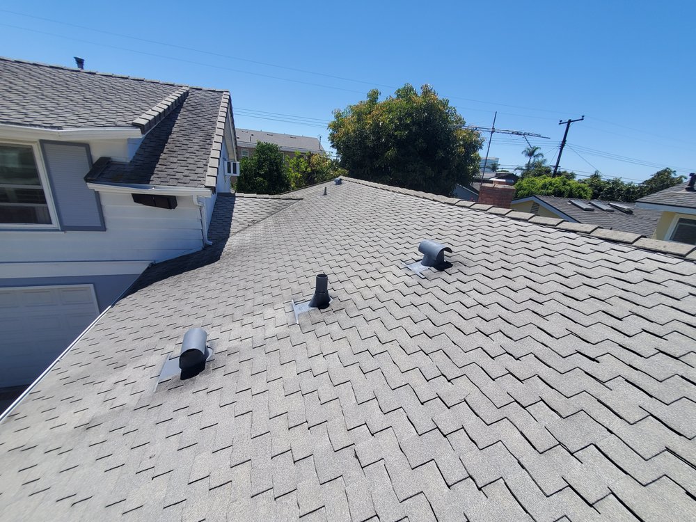 Slide of Mikes Roofing